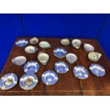 Collection of silver plated ash trays and scallop shaped dishes.