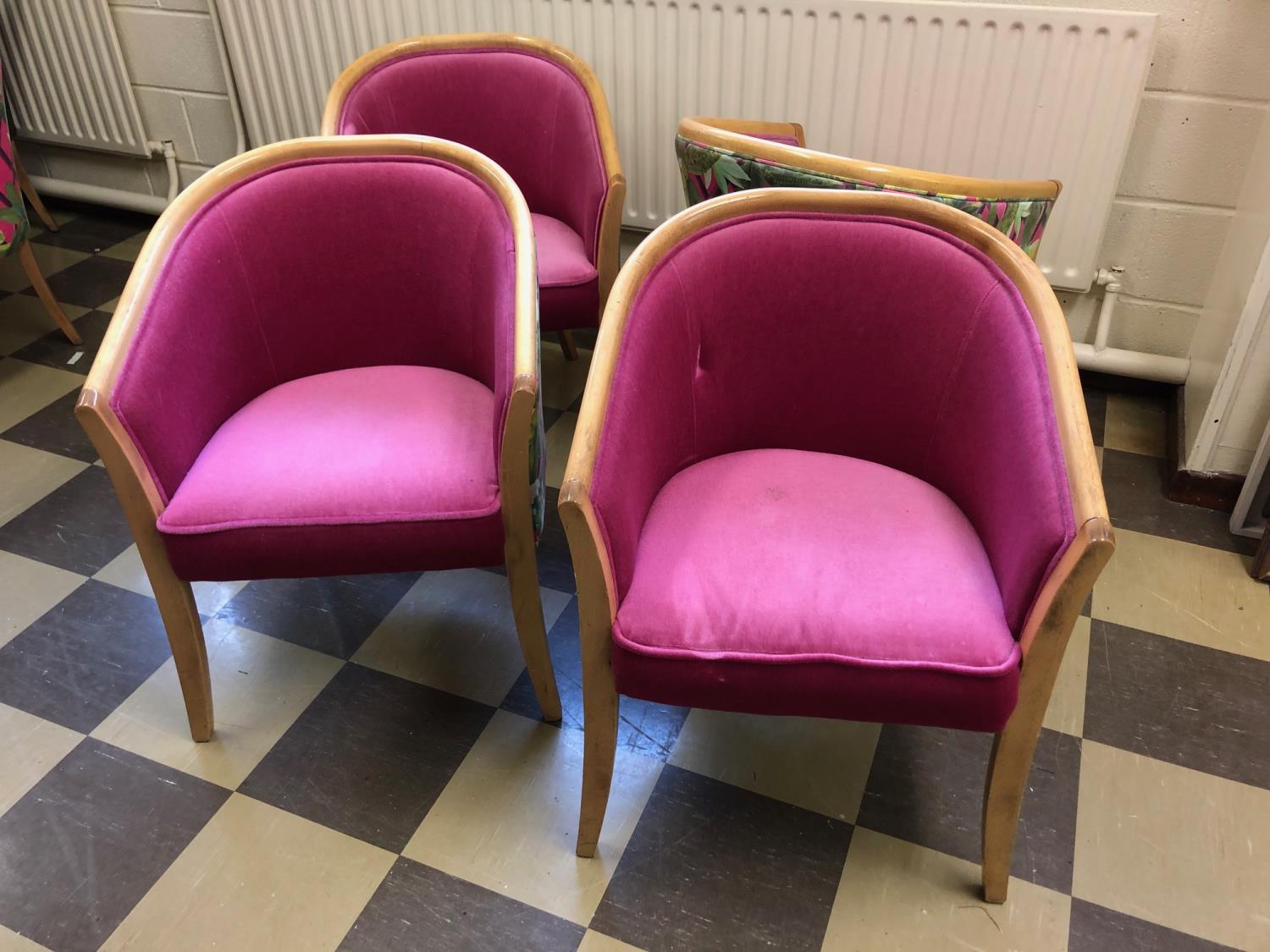 Set of 4 tub chairs with pink fabric, with patterned fabric on reverse.