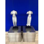 Pair of aluminium semi clad sculptures of the male and female form, standing on black W 23 H 75 D