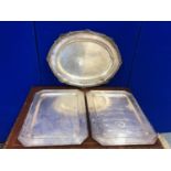 Pair of heavy silver plated trays with canted corner and another oval shaped tray. W 48 L 36