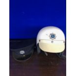 Gardai motorcycle helmet and cap.