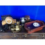 Collection of clocks, brassware and a pair of binoculars.