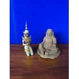 Bronze patinated kneeling buddha along with a stone seated buddha.