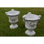 Pair of stone circular planters with floral decoration W 65 H 80