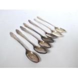 Set of five silver coffee spoons, Sheffield 1931, plus two Hanoverian pattern silver spoons.