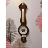 Mahogany banjo barometer.