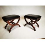 Pair of mahogany and leather footstools.