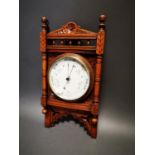 Edwardian carved oak barometer.