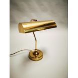 Brass desk lamp.