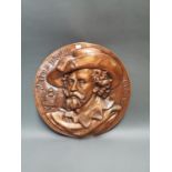 Embossed copper wall plaque.