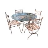 Wrought iron garden table and four chairs.