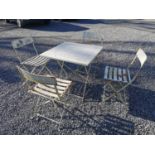 Metal garden table and four chairs.