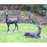Two decorative cast iron models of Stags.