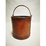 Early 20th C. leather and copper coal bucket.