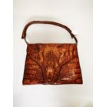 Crocodile skin ladies handbag.