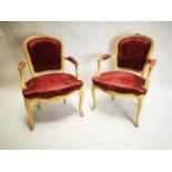 Pair of upholstered arm chairs.