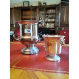 Two silver plate ice buckets.