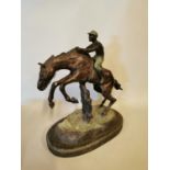 Bronze model of a Horse and Jockey.