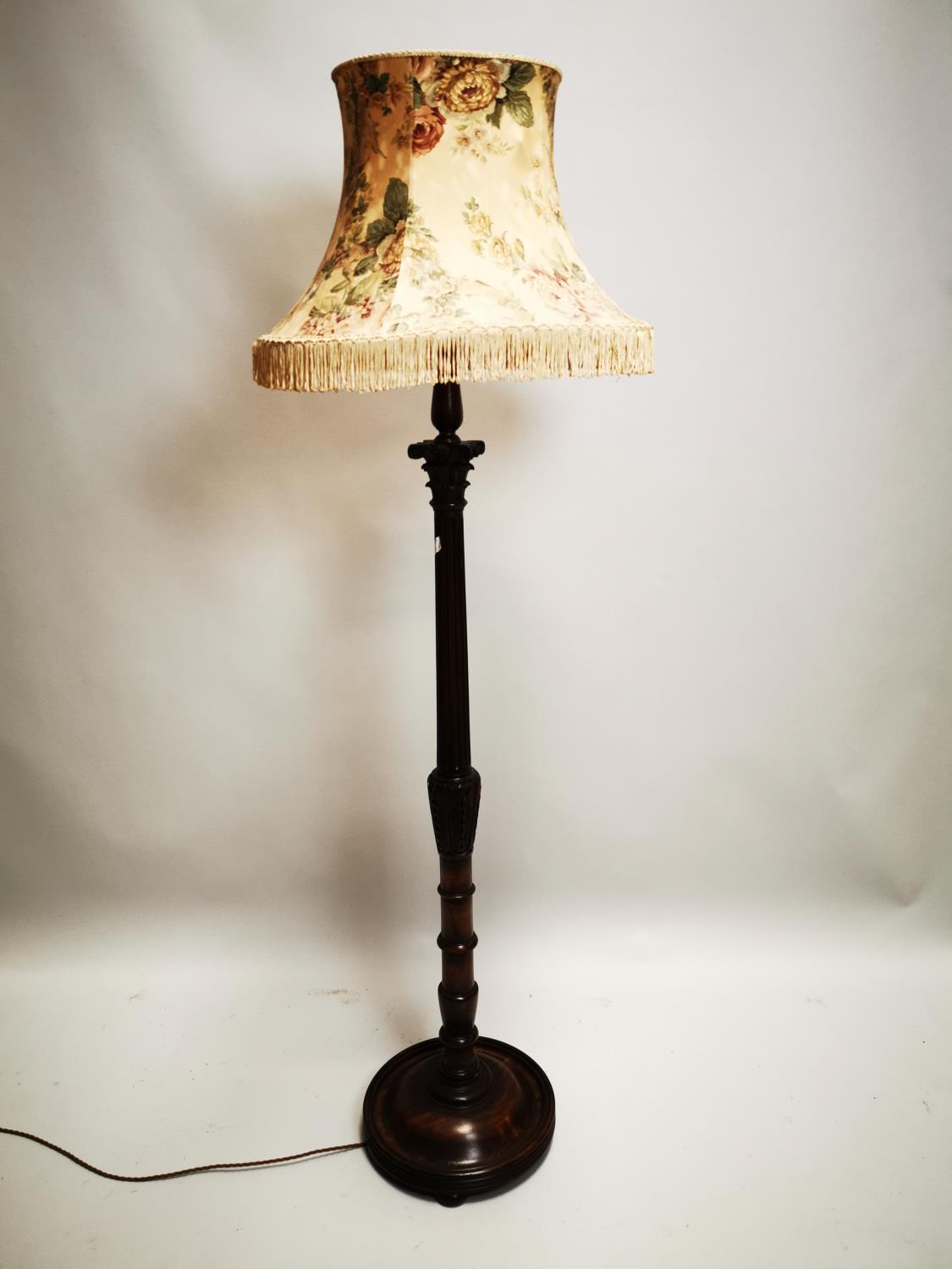 1920s carved mahogany standard lamp.