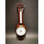 Edwardian carved oak barometer.