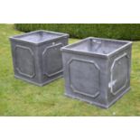 Large pair of faux lead planters.