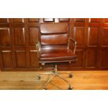 Revolving leather and chrome office chair