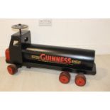 Wooden Guinness advertising toy tanker