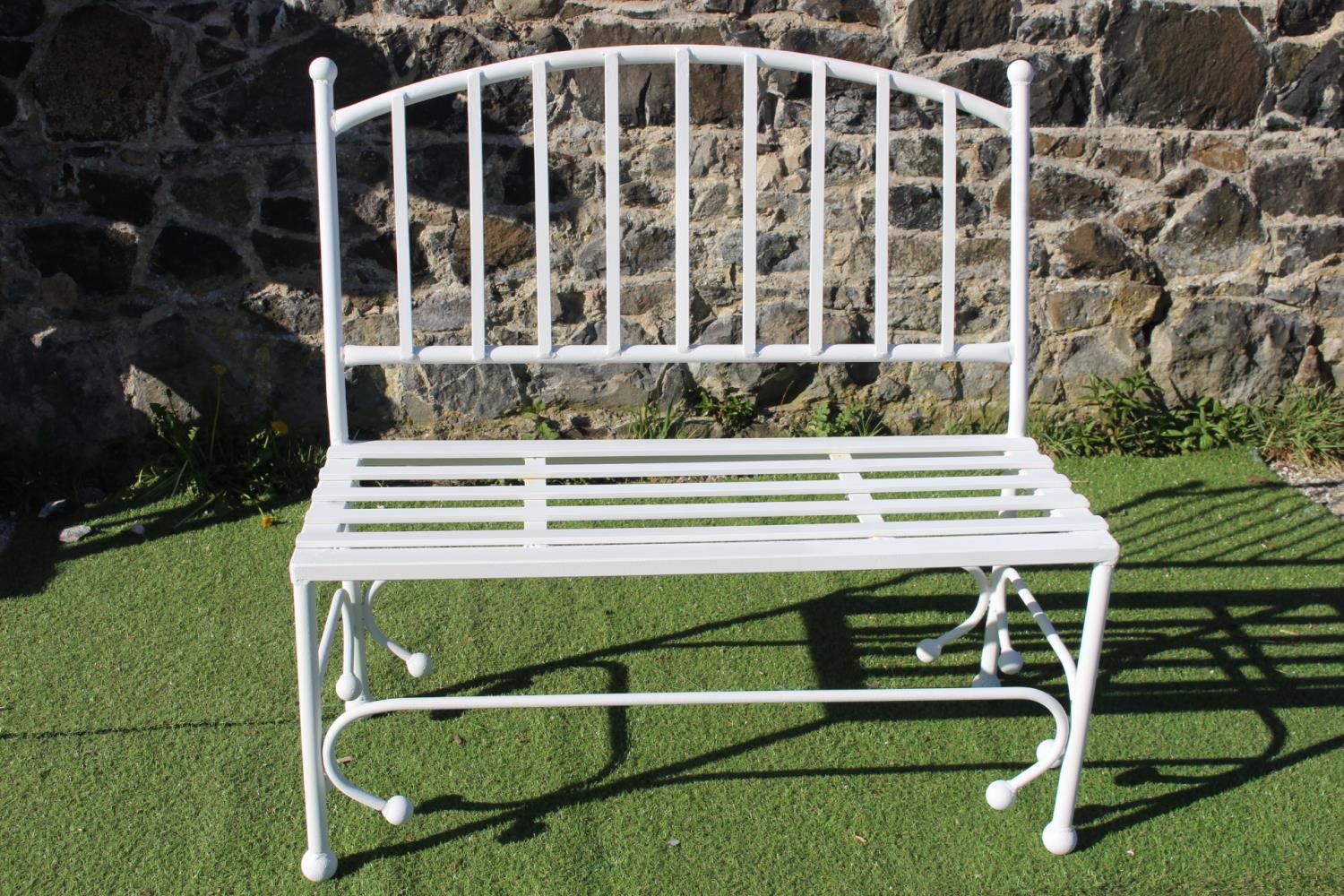 Wrought iron garden seat.