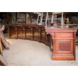 Mahogany curved bar counter.