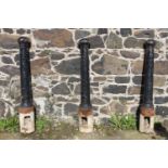 Set of three cast iron bollards