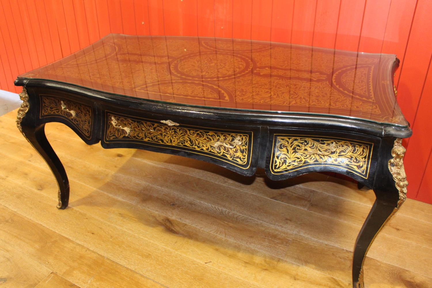 Ebonised mahogany and gilt side table