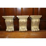 Three plaster corbels