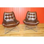 Pair of leather upholstered deep buttoned back chairs