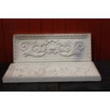 Pair of plaster moulded plaques