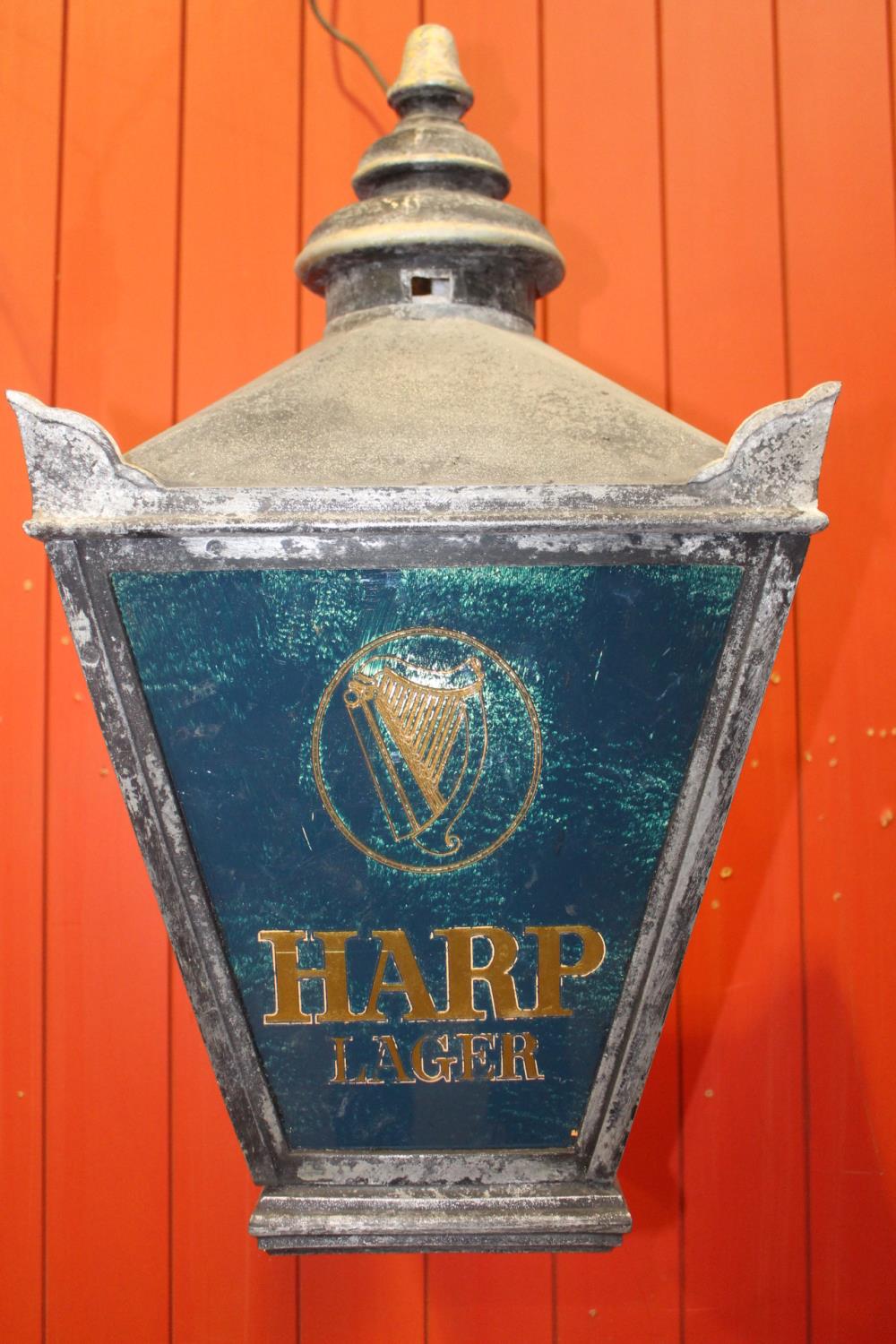 Harp advertising street lamp.