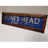 Boar's Head tobacco advertising sign.