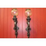 Pair of bronze wall sconces