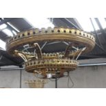 Large two tiered brass chandelier.
