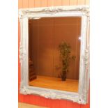 Carved silvered wall mirror