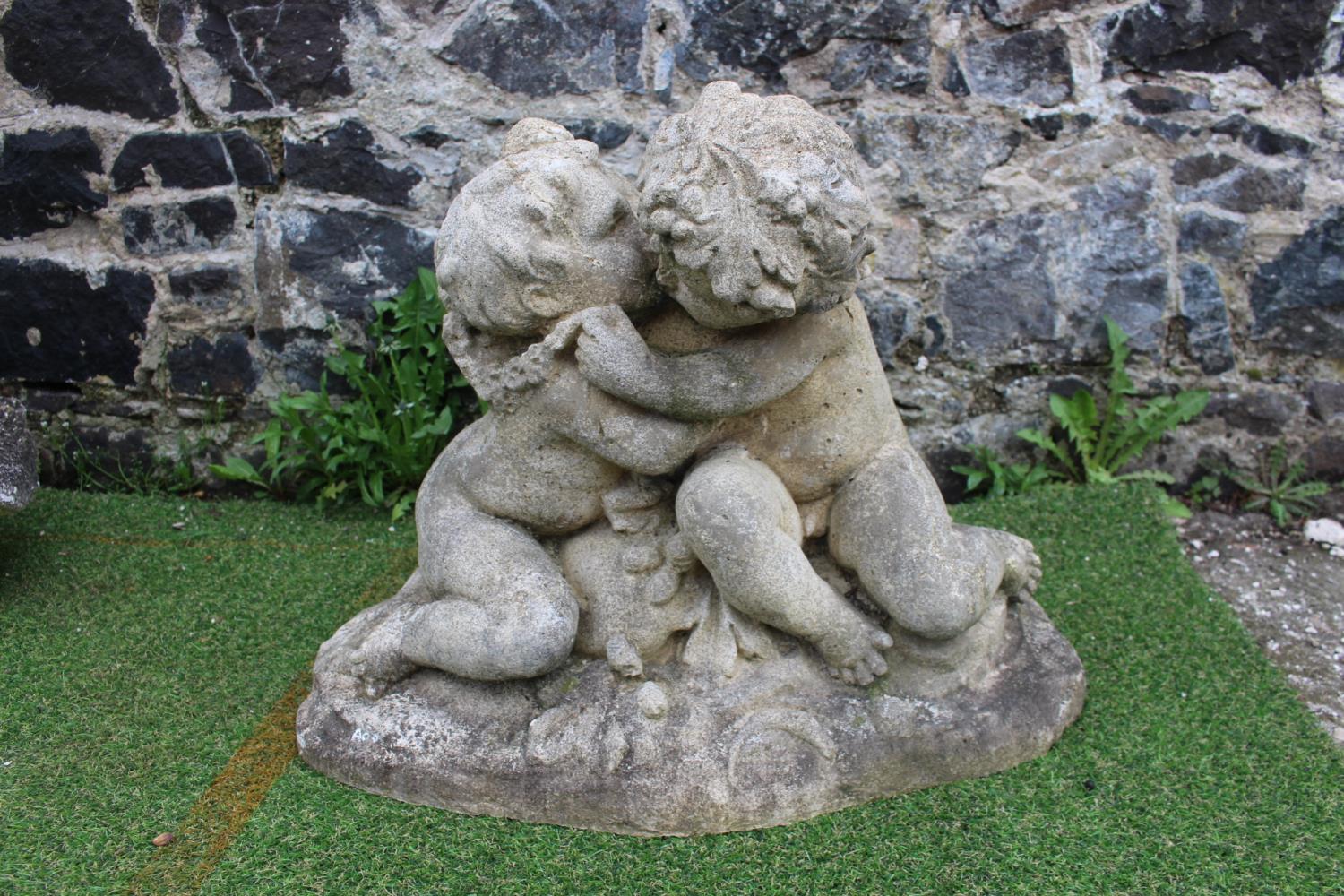 Stone statue of Boy and Girl