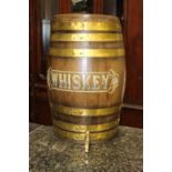 Oak and brass bound Whiskey barrel.
