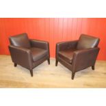 Pair of leather upholstered retro style armchairs