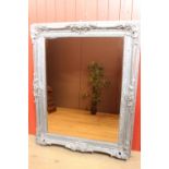 Carved silvered wall mirror