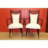 Pair of faux leather upholstered carver armchairs