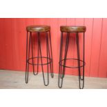 Pair of leather upholstered metal Hairpin stools