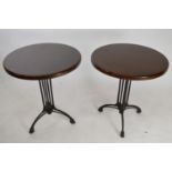 Pair of good quality cast iron pub tables.