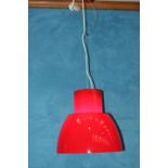 Red Perspex hanging light.