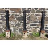 Set of three cast iron bollards