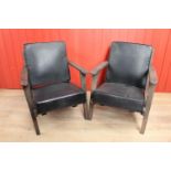 Pair of wooden and leather upholstered easy chairs