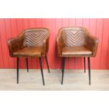 Pair of leather tub chairs